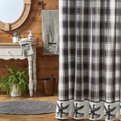 Loon In Motion Shower Curtain