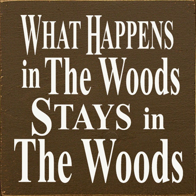 What Happens in the Woods Sign